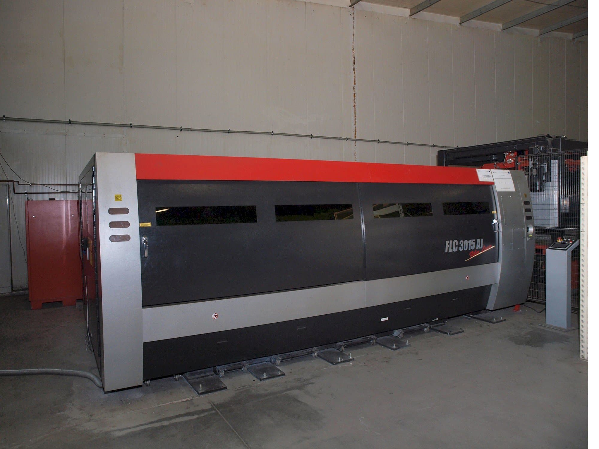 Front view of AMADA LC-3015 AJ 2kW Fiber laser  machine
