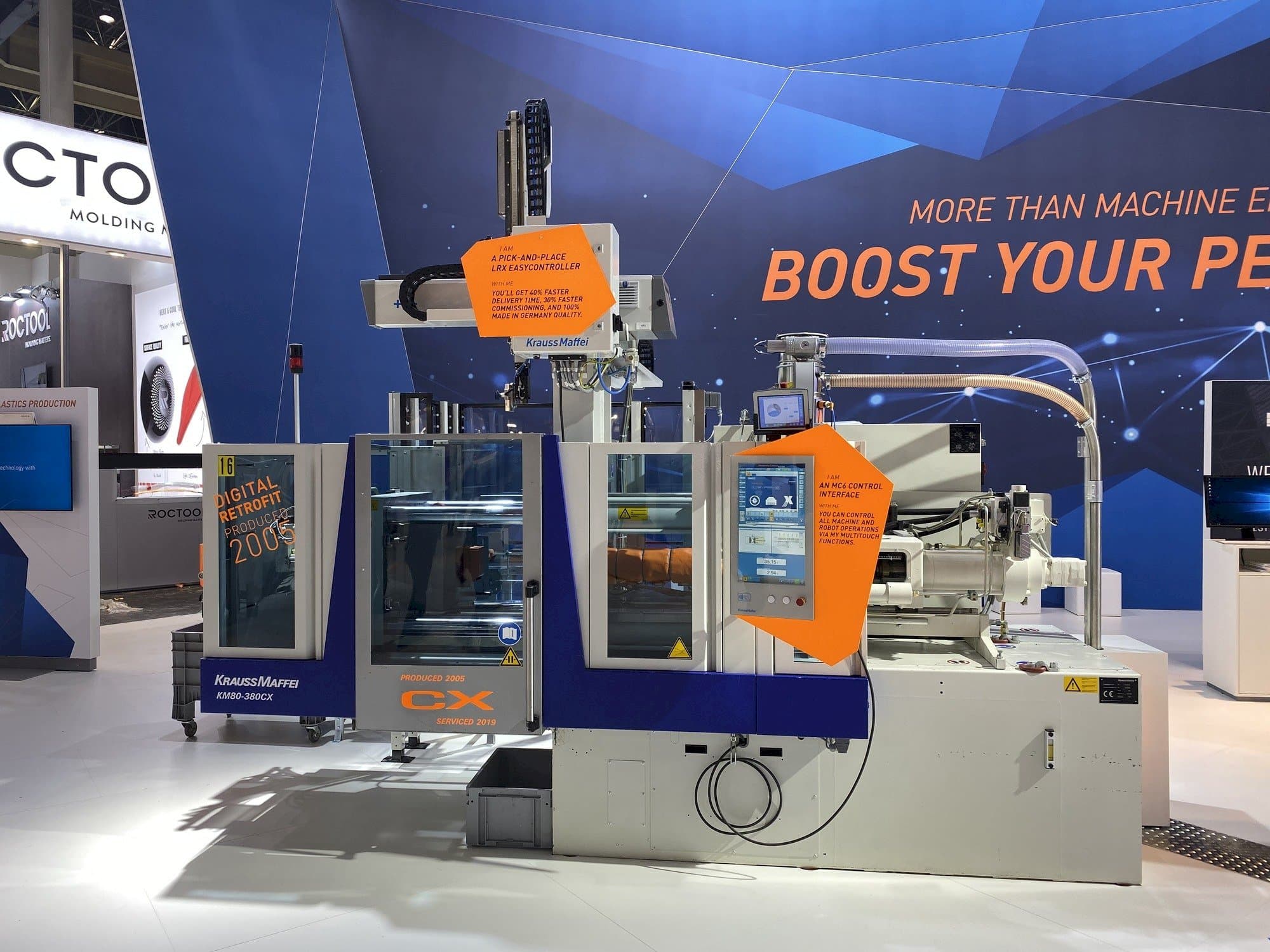 Front view of Krauss Maffei 80-380 CX + LRX easyControl 100  machine