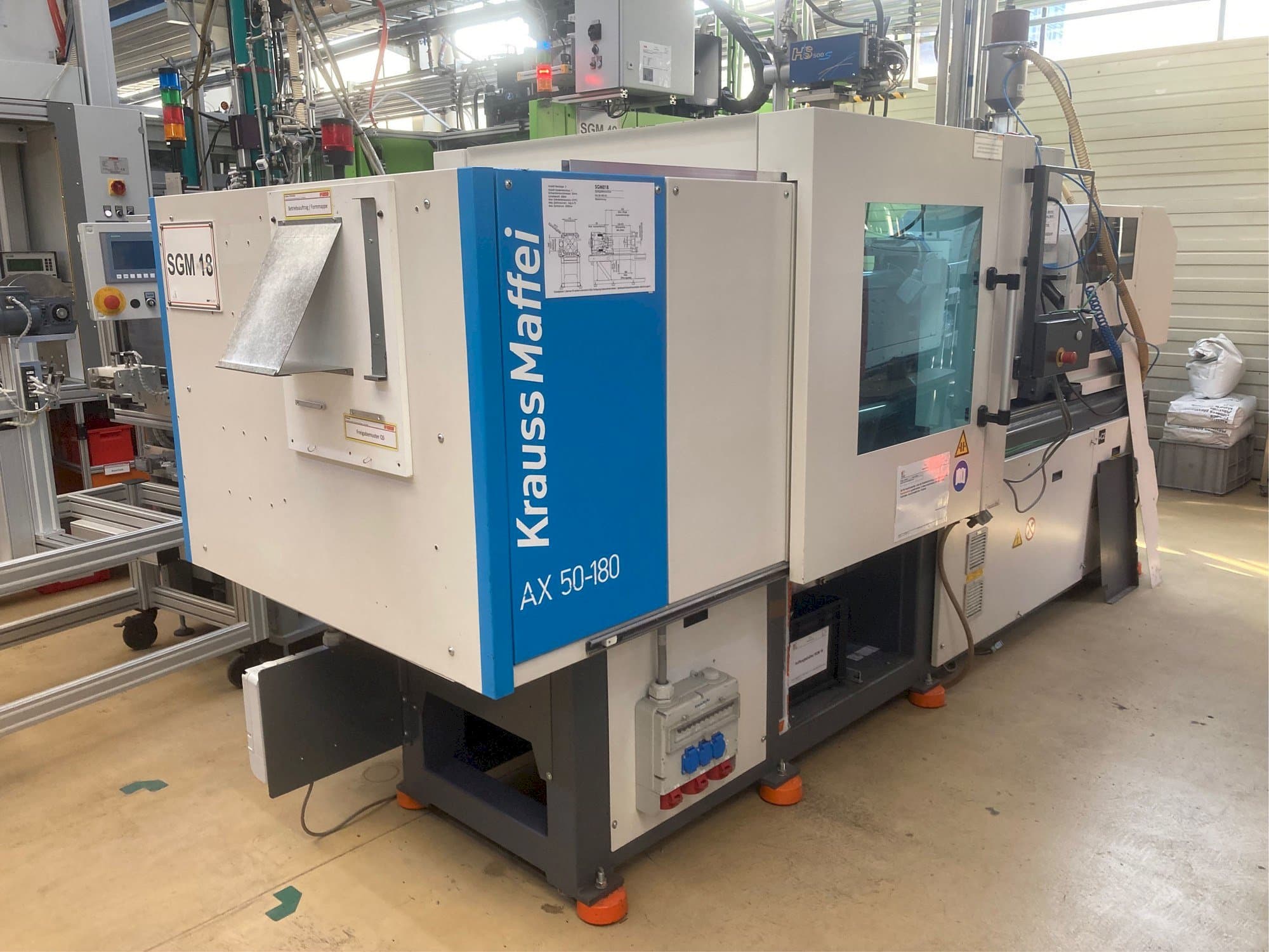 Left side view of Krauss Maffei AX 50-180  machine