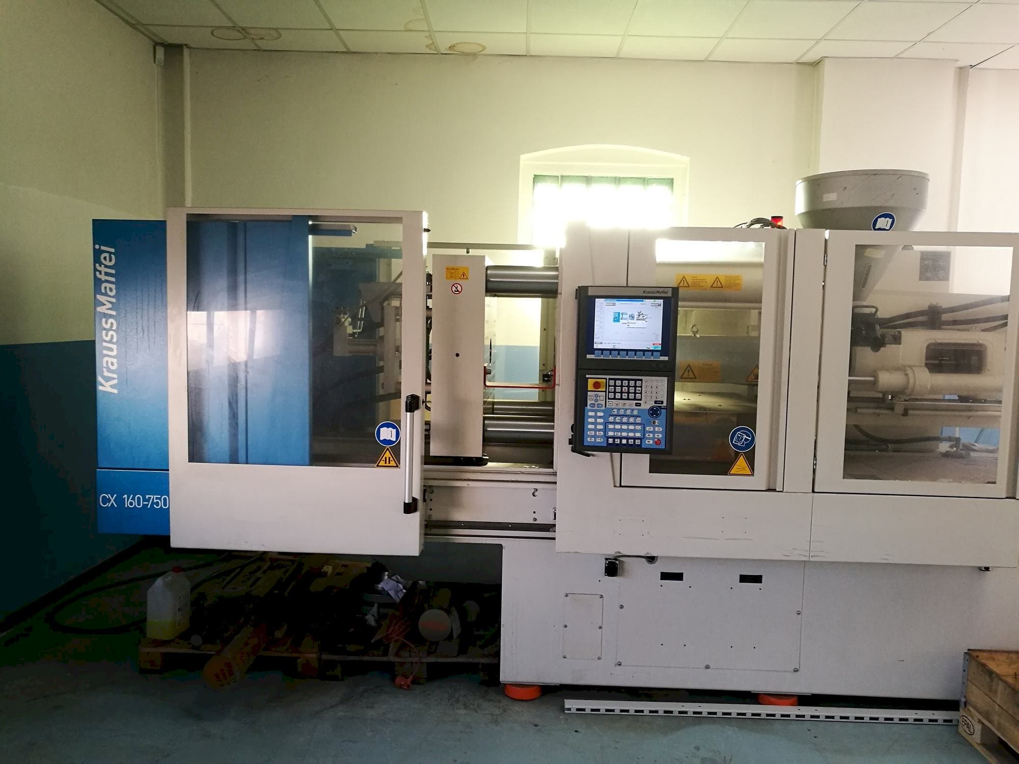 Front view of Krauss Maffei KM 160-750 CX  machine