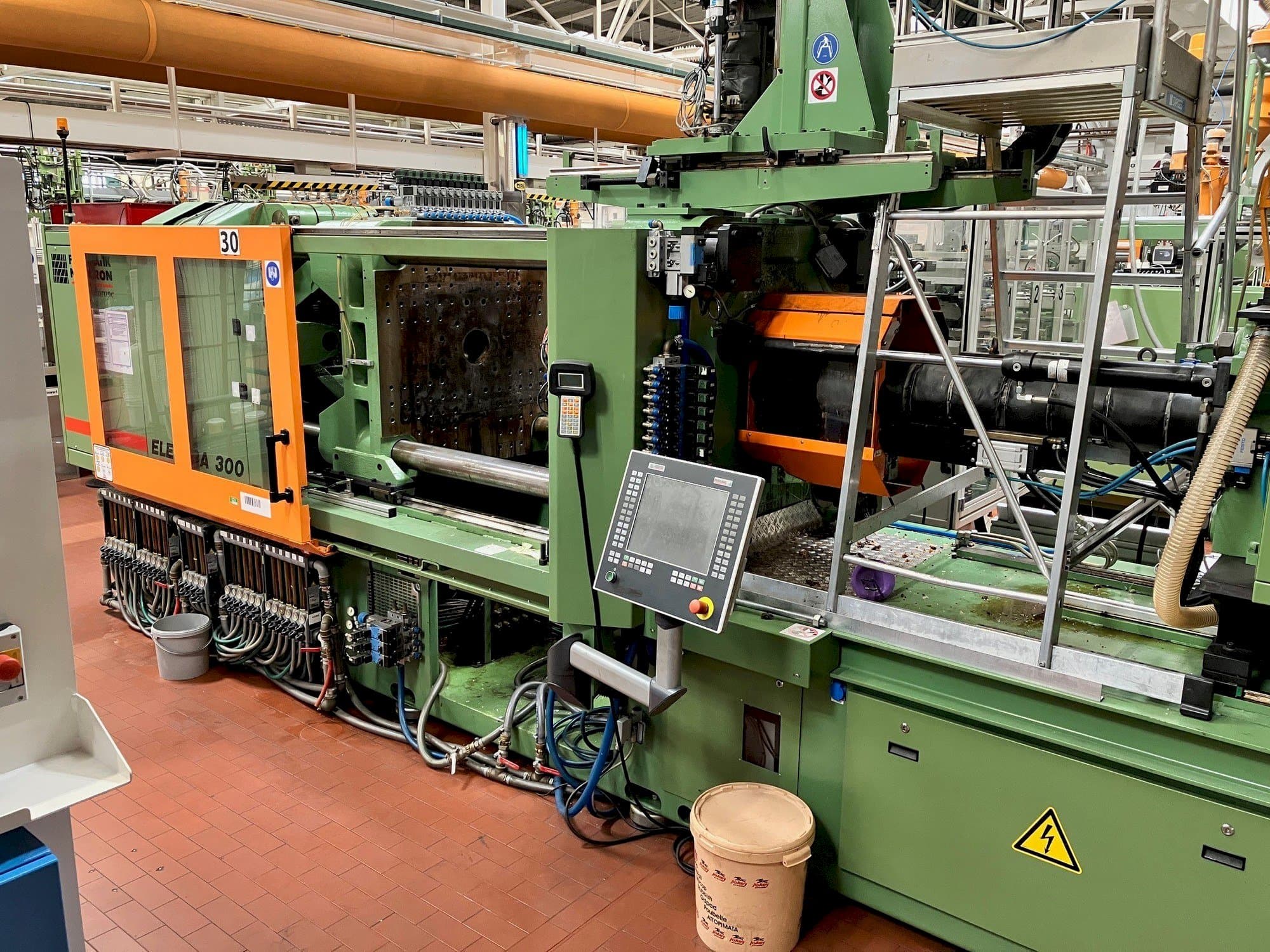 Front view of FERROMATIK MILACRON Europe Elektra 300  machine