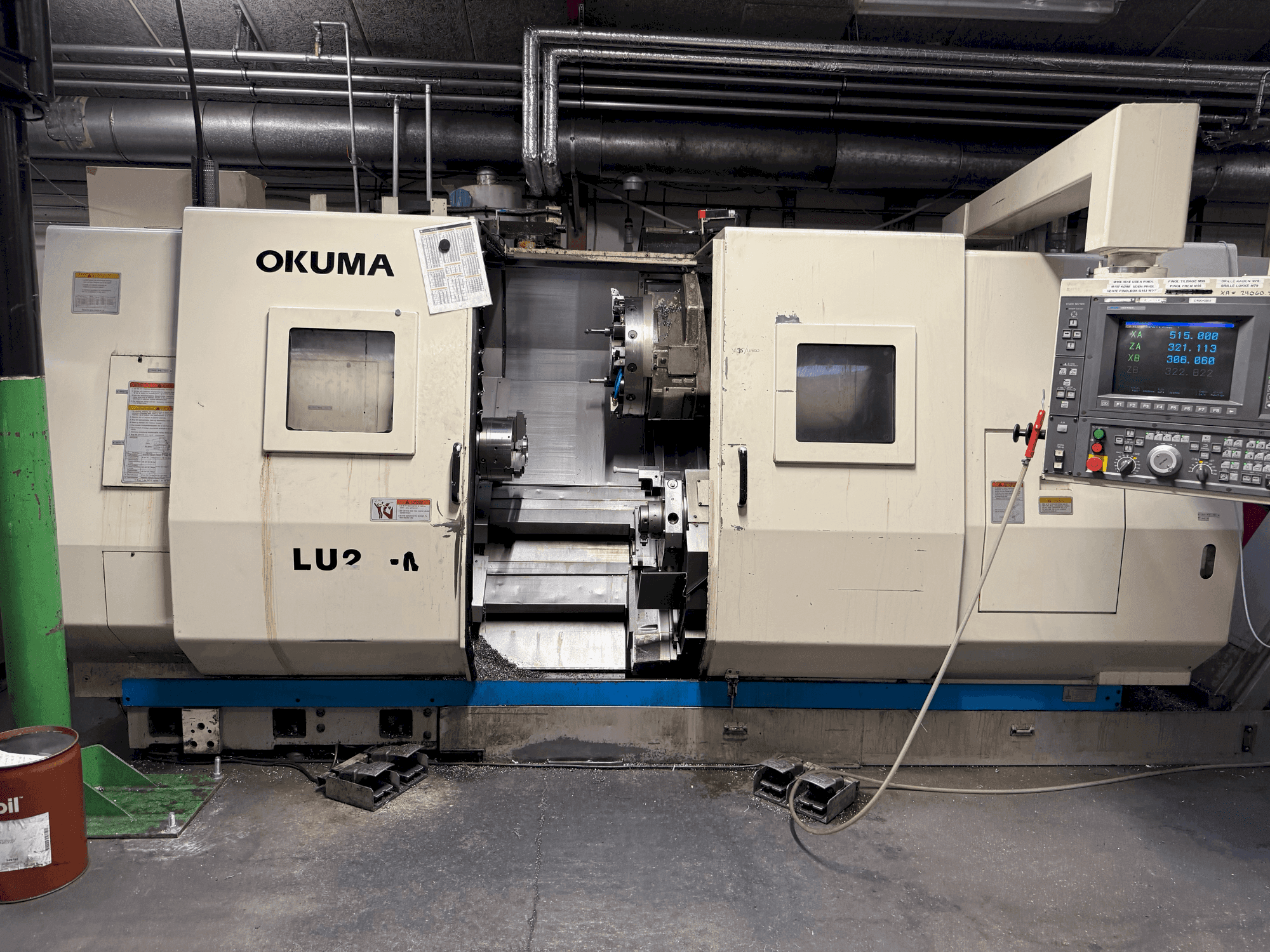 Front view of Okuma LU2-M  machine