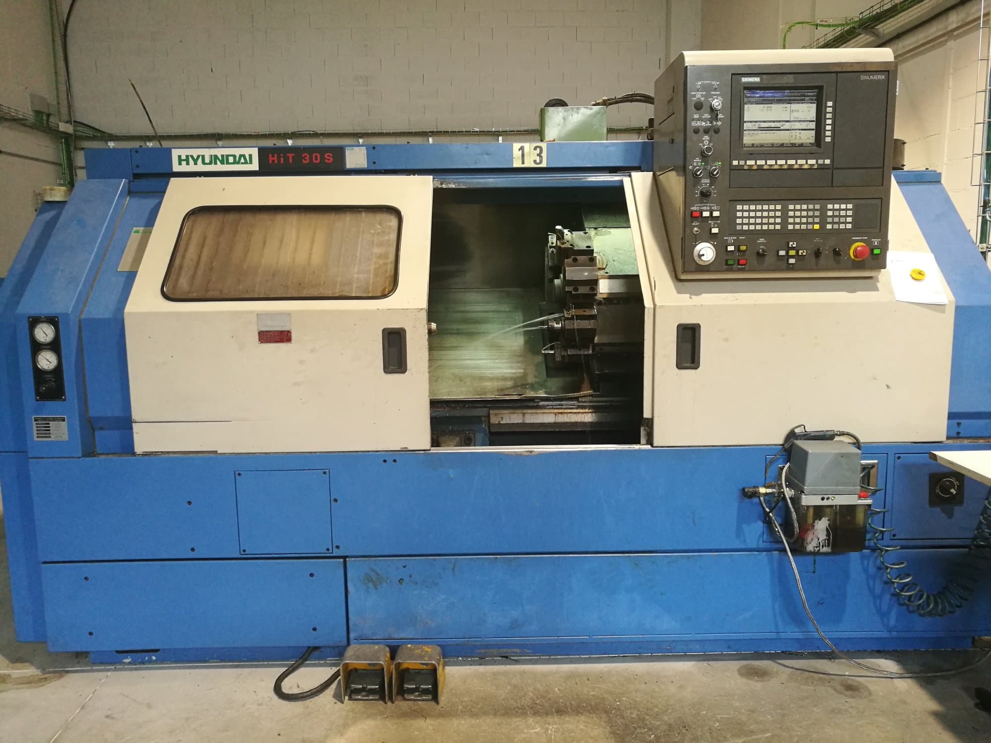 Front view of Hyundai Kia HiT-30S Machine