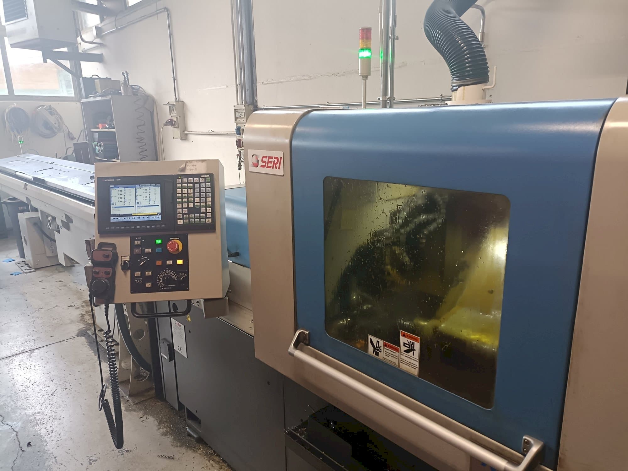 Front view of NOMURA   machine