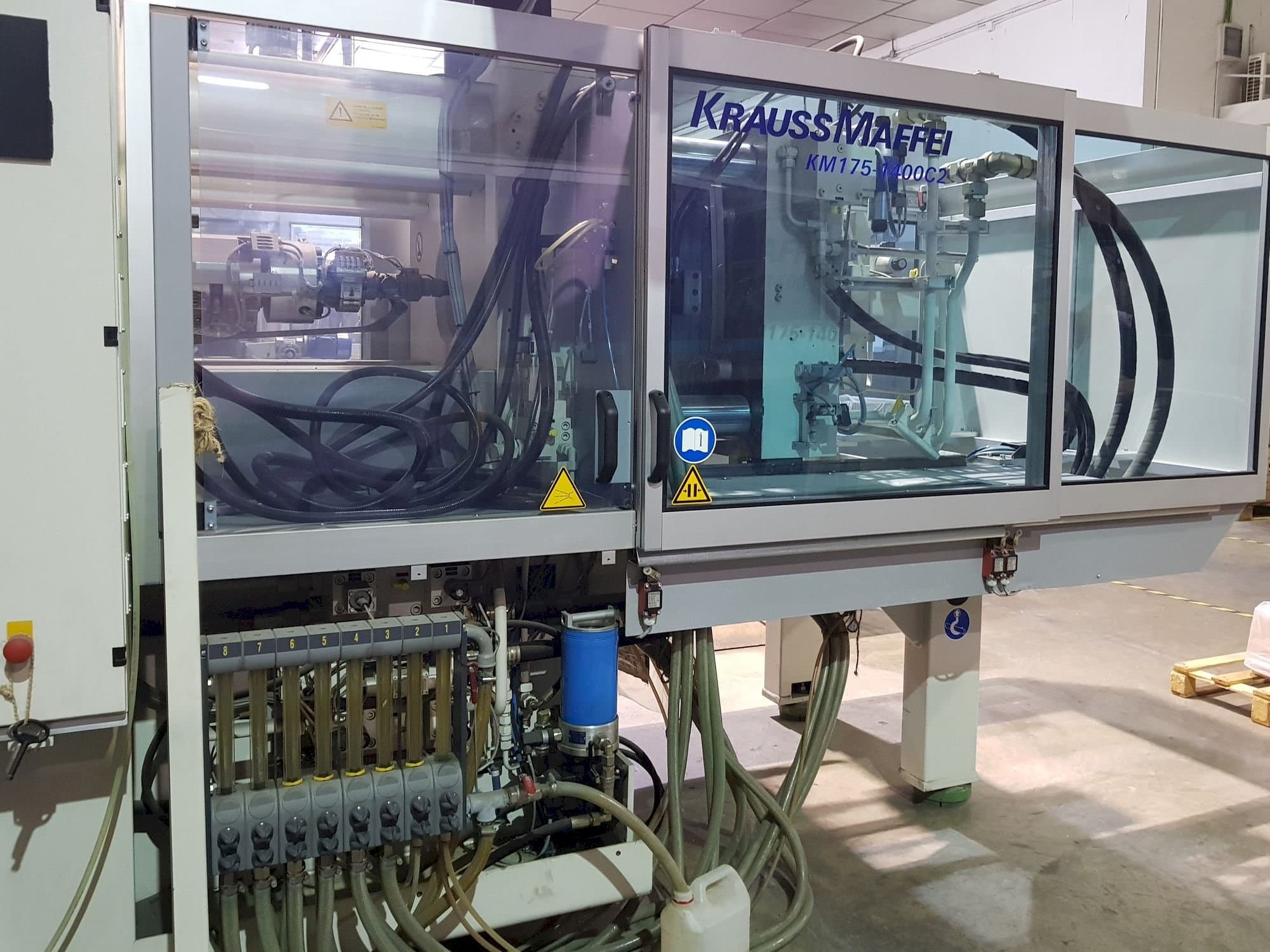 Front view of Krauss Maffei 175-1400 C2  machine