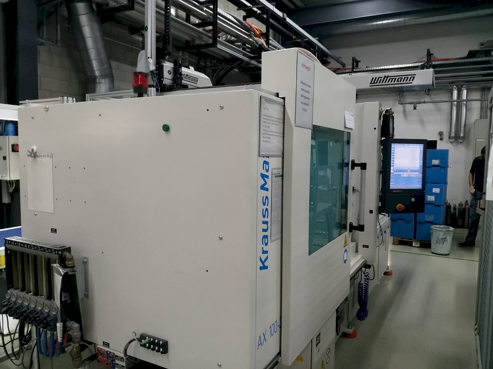 Front view of Krauss Maffei 100-380 AX  machine