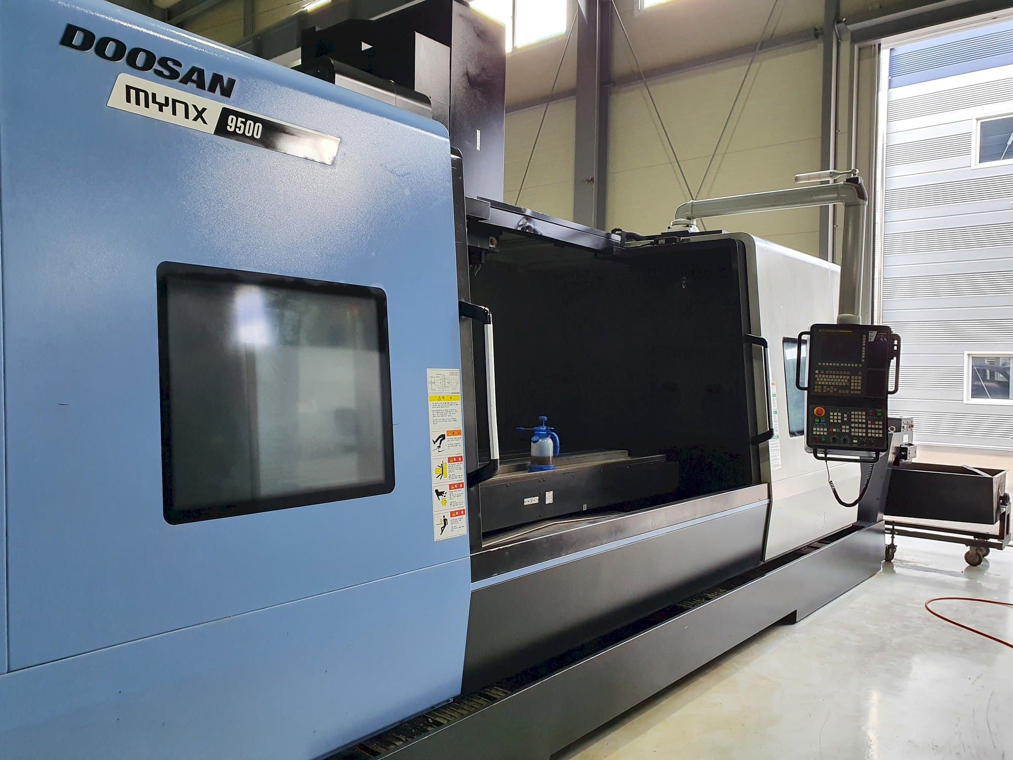 Front view of Doosan MYNX 9500  machine