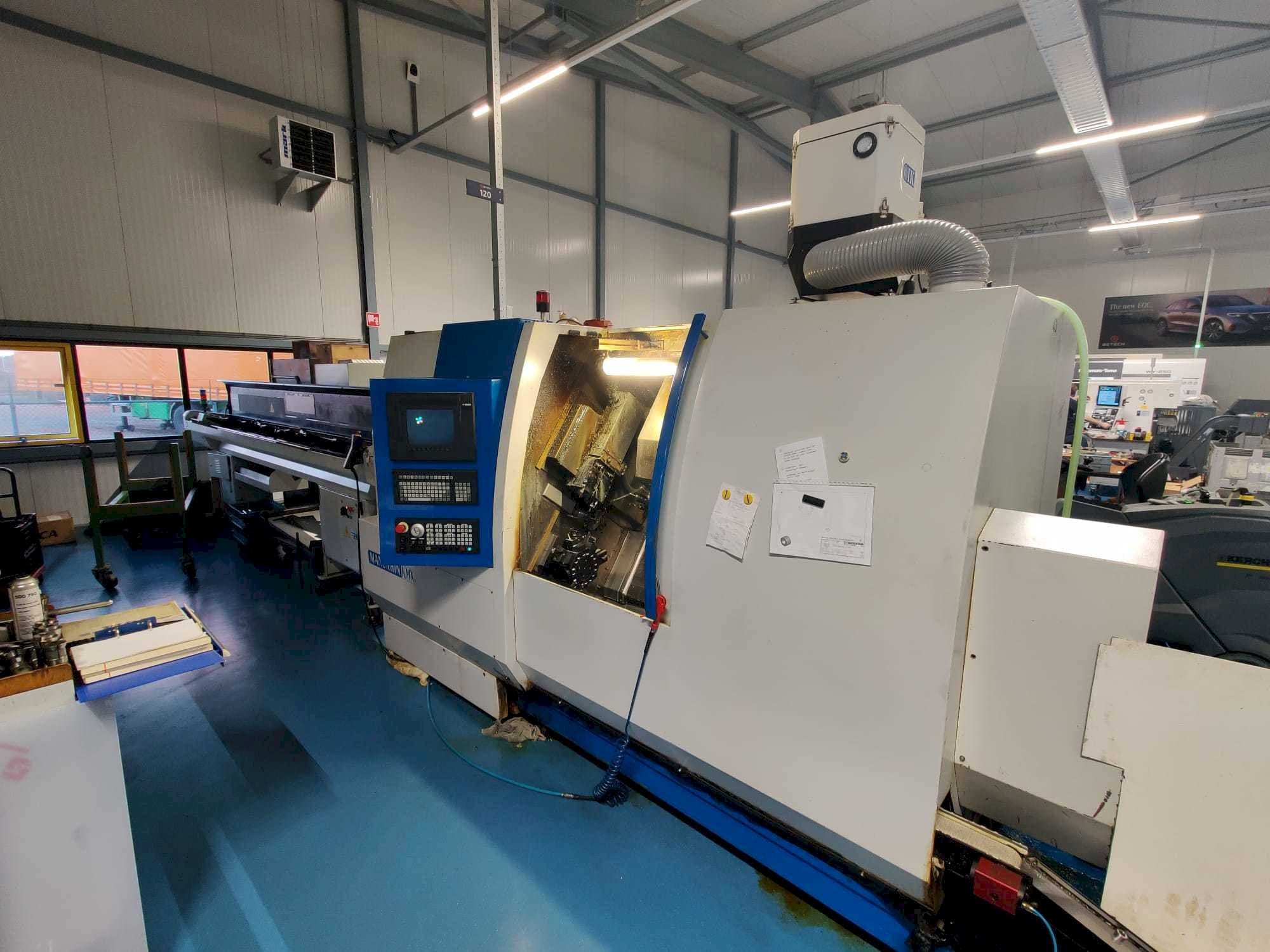 Front view of Manurhin K'MX XL 32  machine