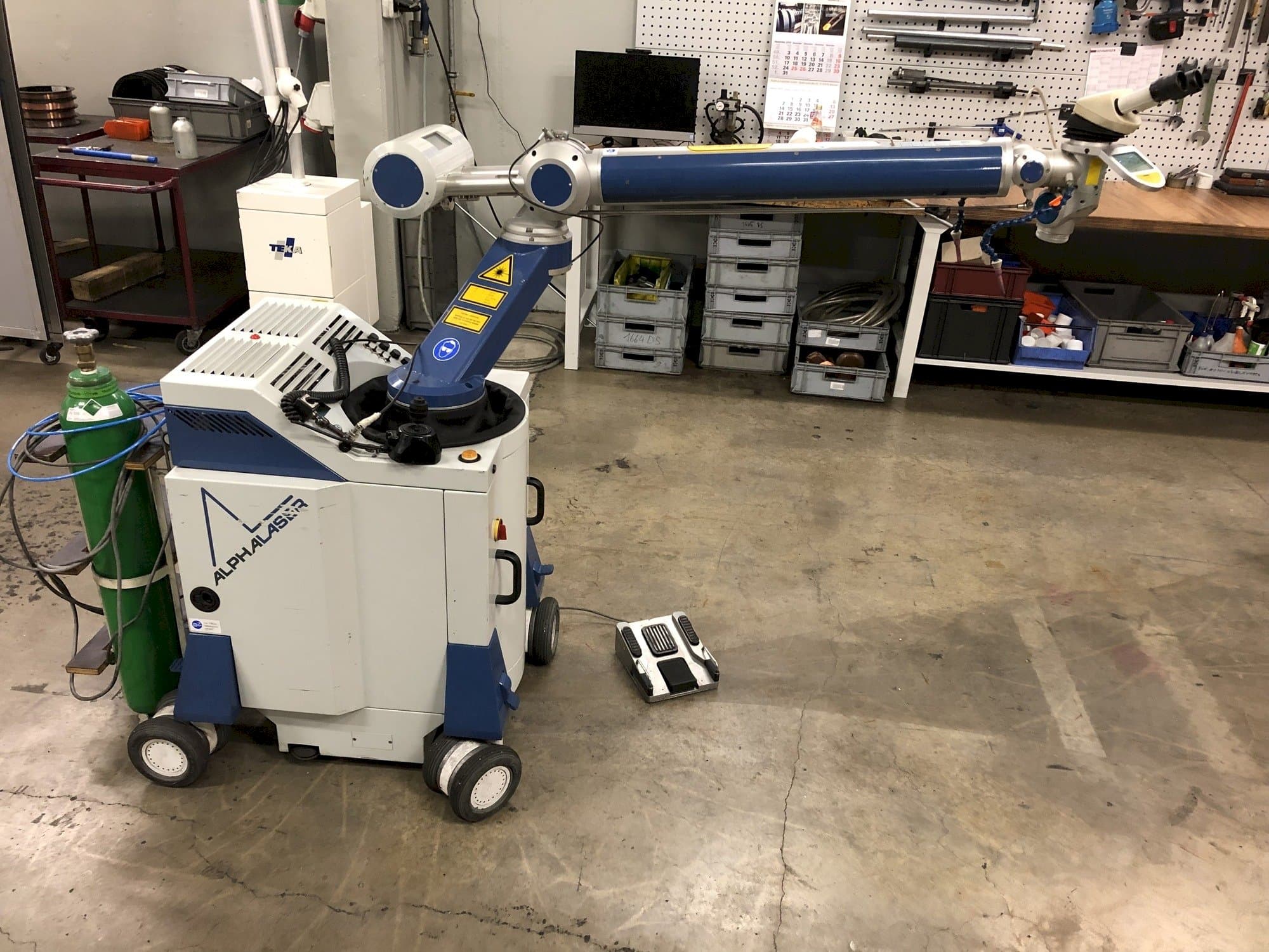 Left view of ALPHA LASER ALM 200  machine