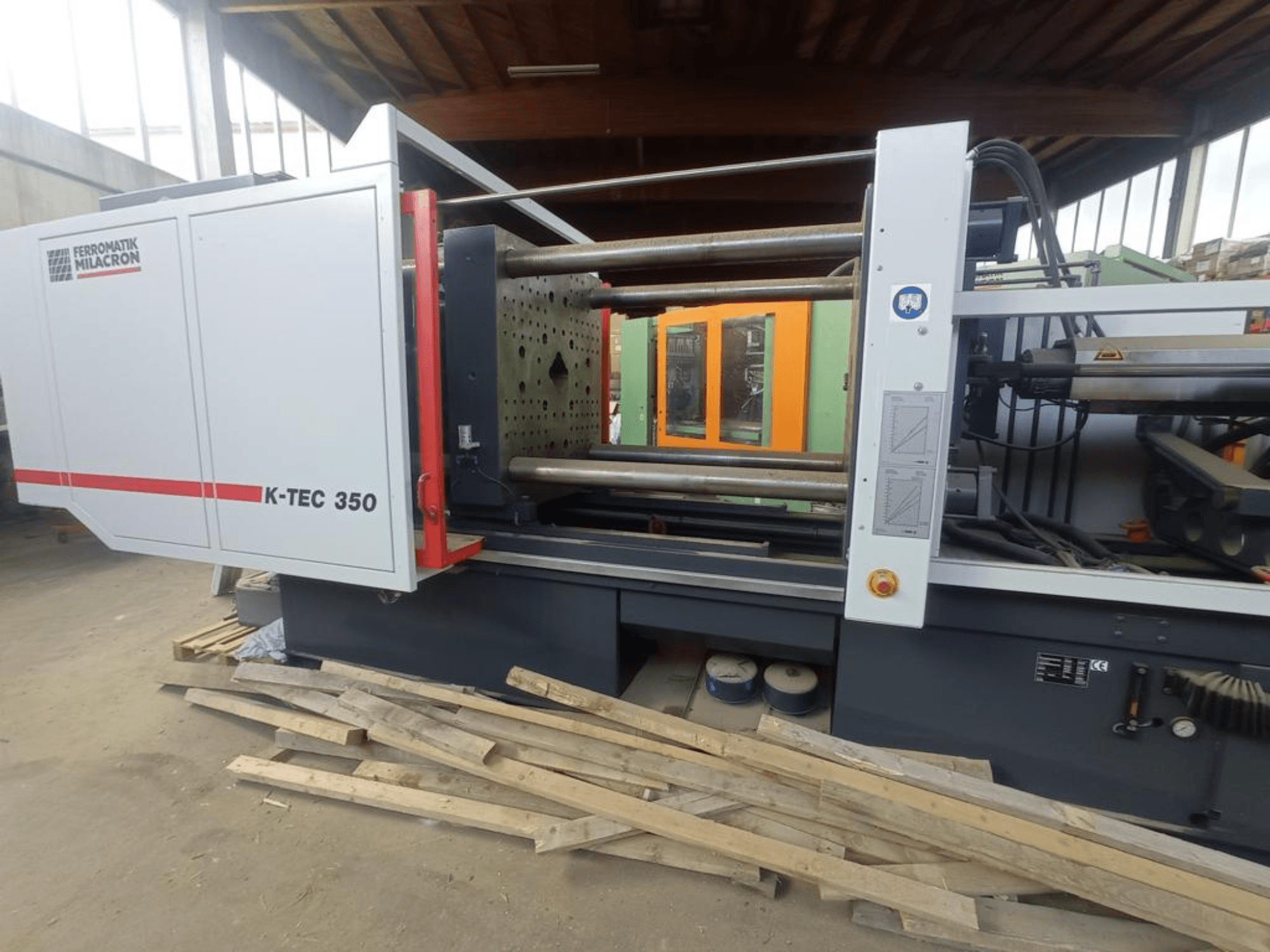 Fiber laser cutting machine Prima Power Laser Genius+ 1530 viewed from the side, showing detailed components and controls.