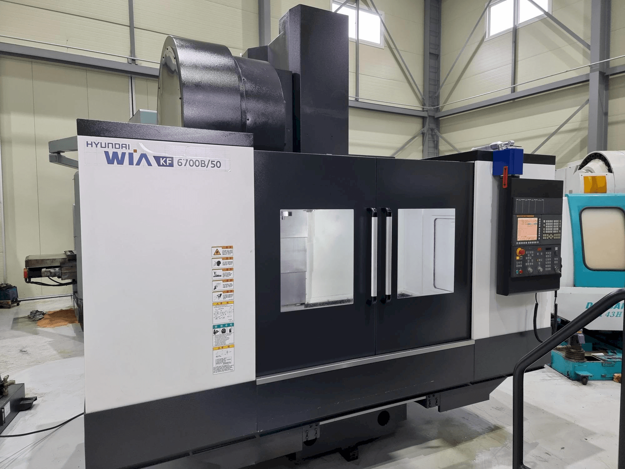 Front view of Hyundai Wia KF 6700B/50 machine