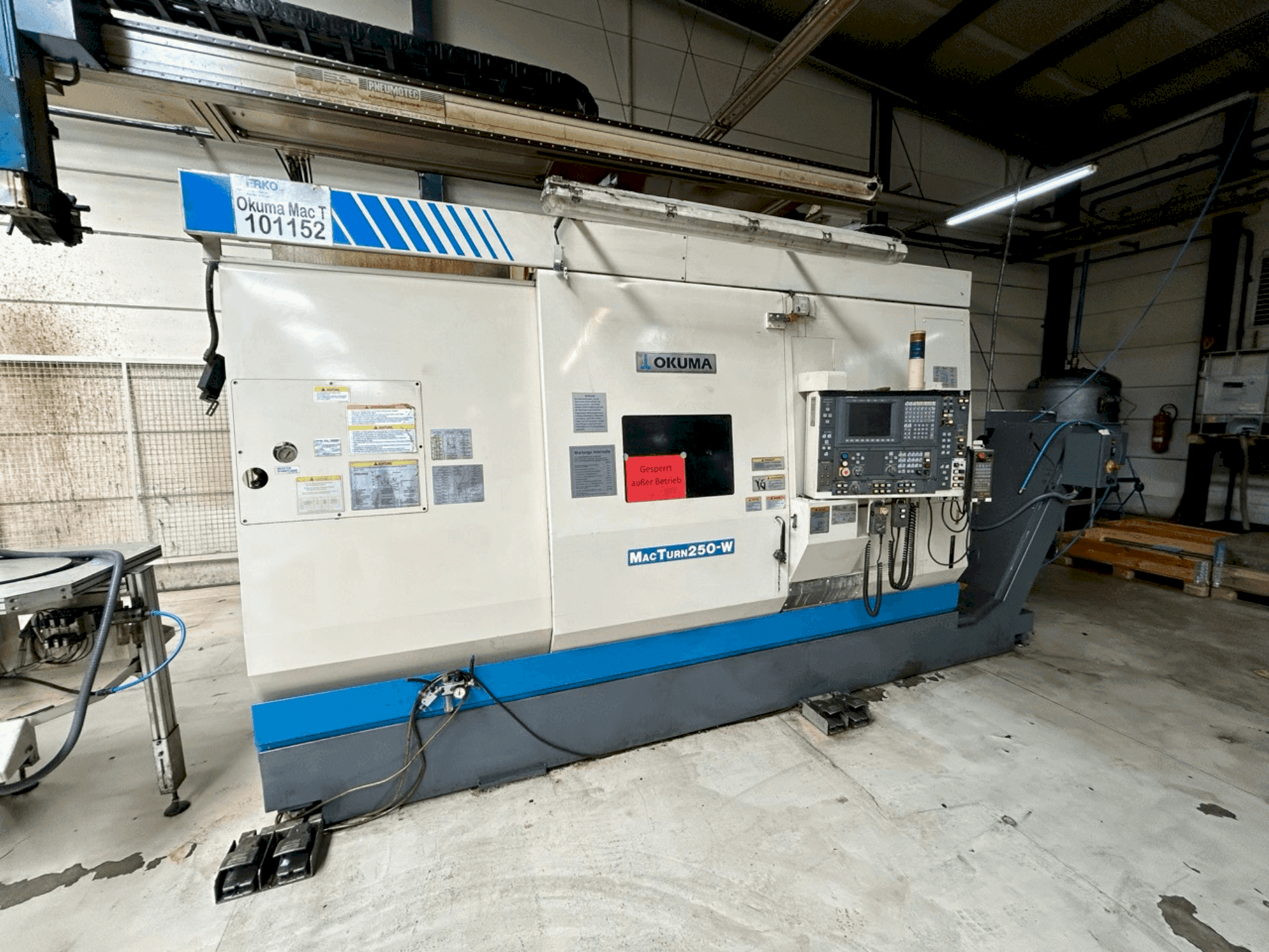Front view of Okuma Macturn 250W machine