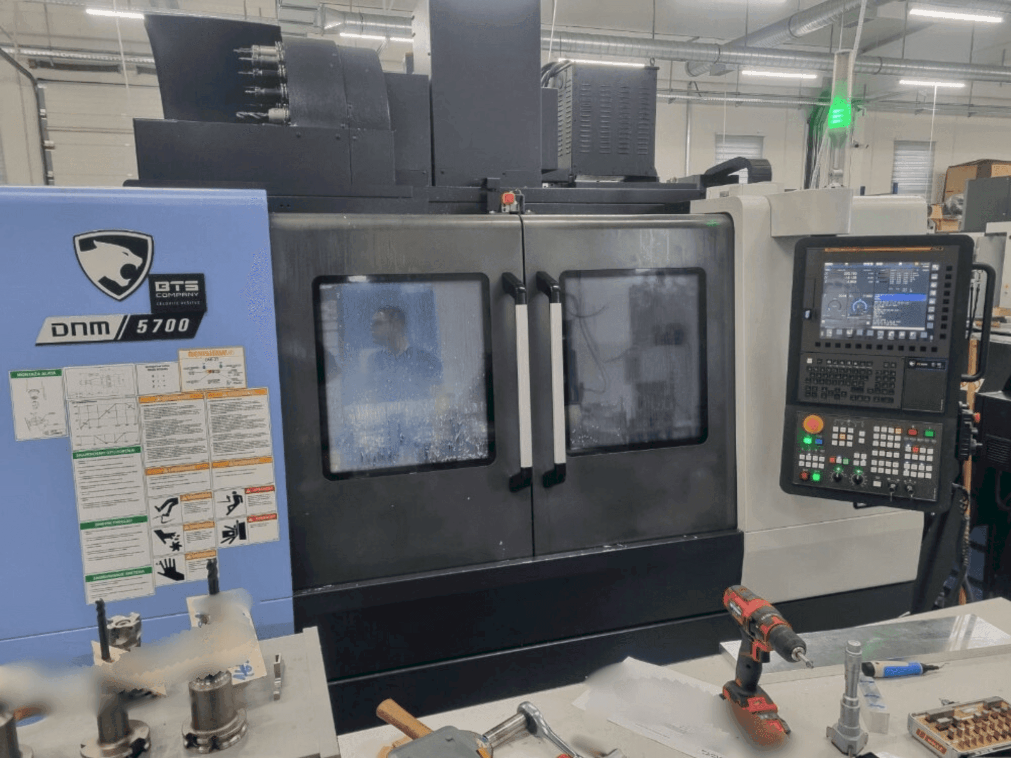Front view of DN SOLUTIONS DNM 5700 machine