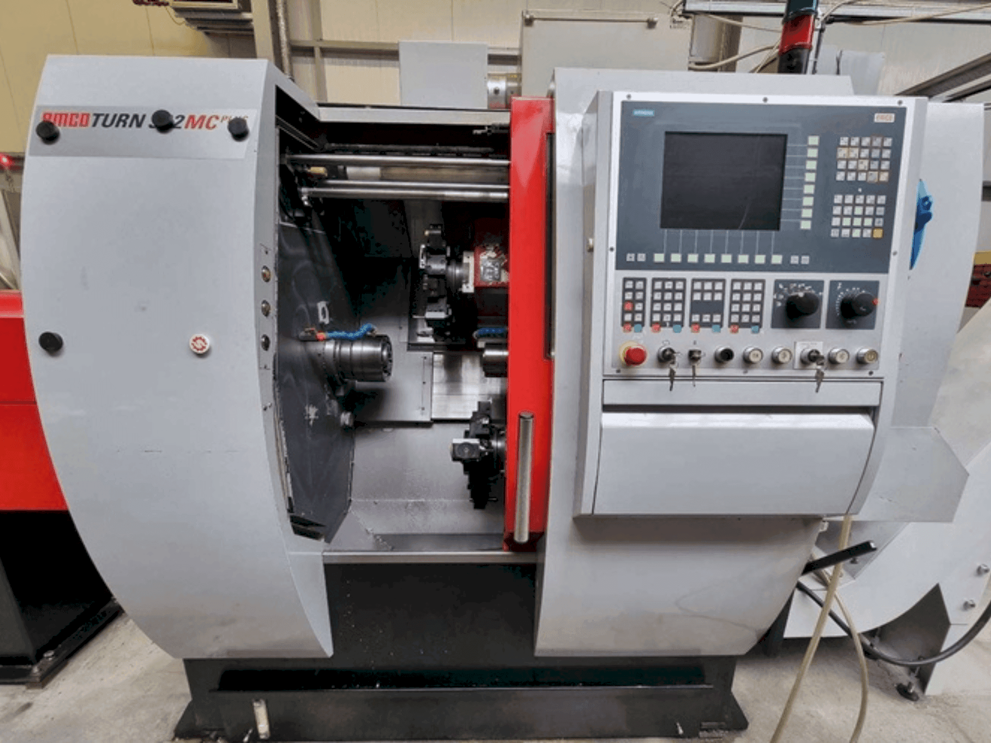 Front view of EMCO TURN 332 MCPlus machine