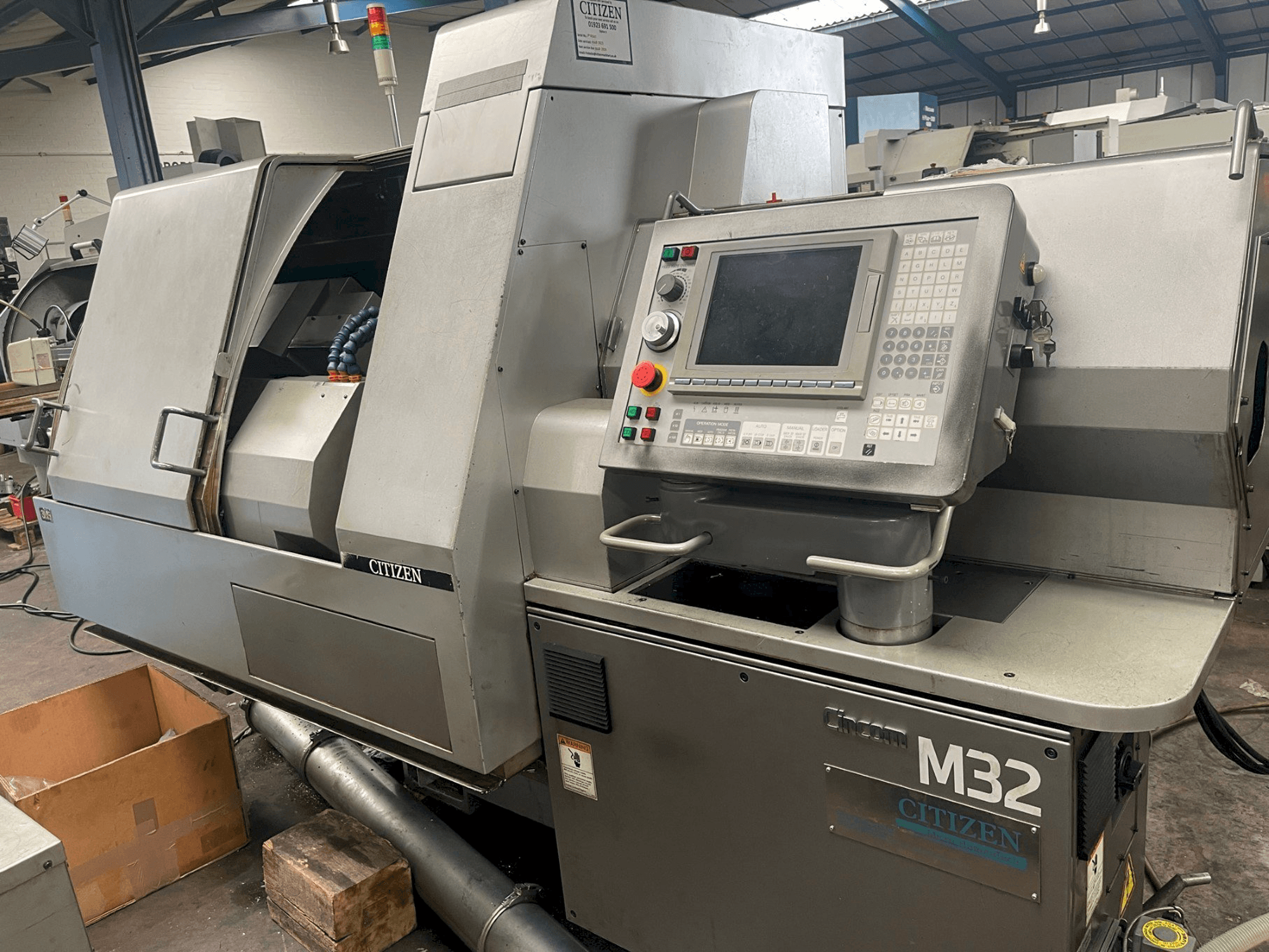 Front view of Citizen M-32V machine