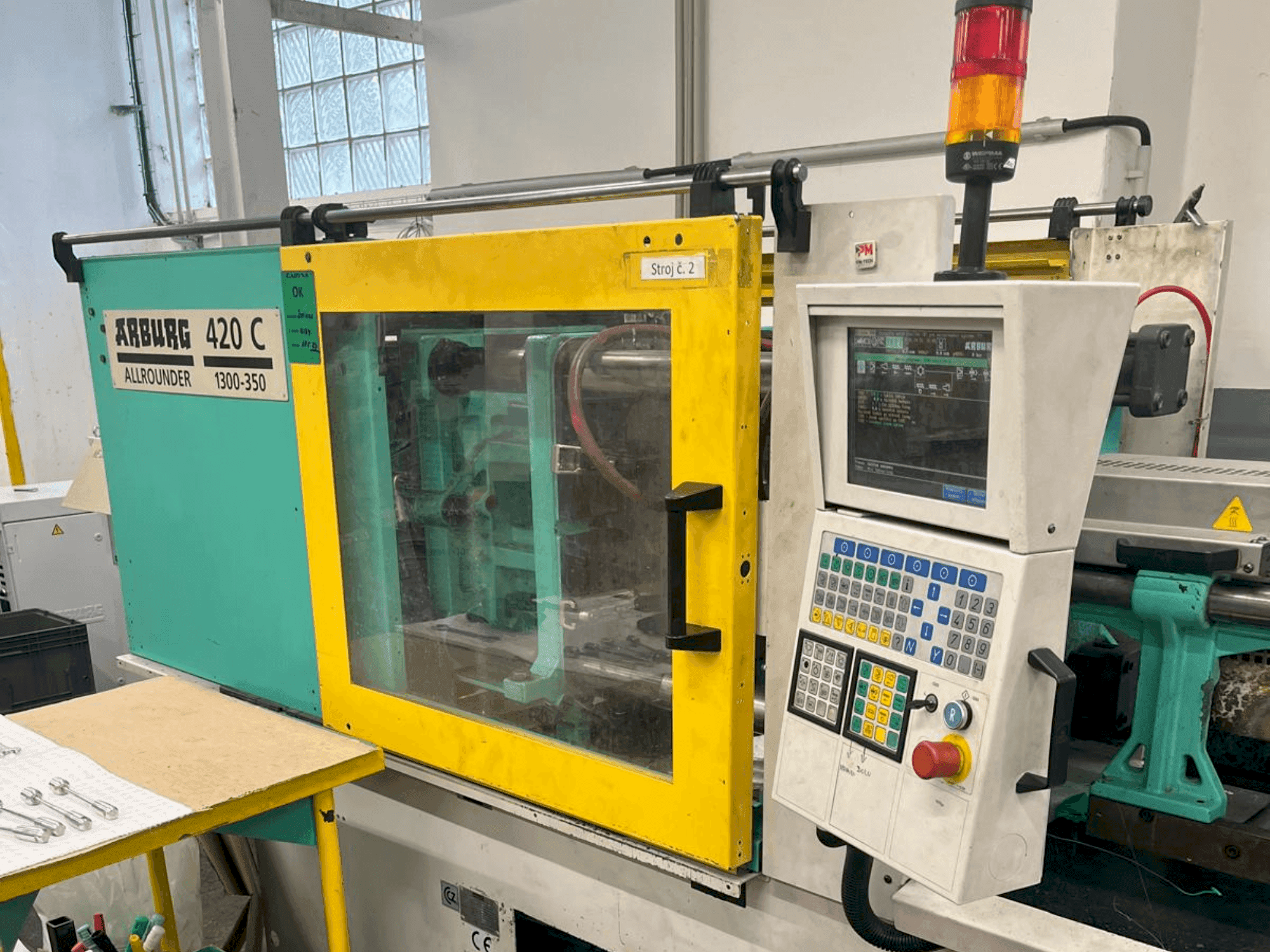 Front view of Arburg Allrounder 420 C 1300-350 machine