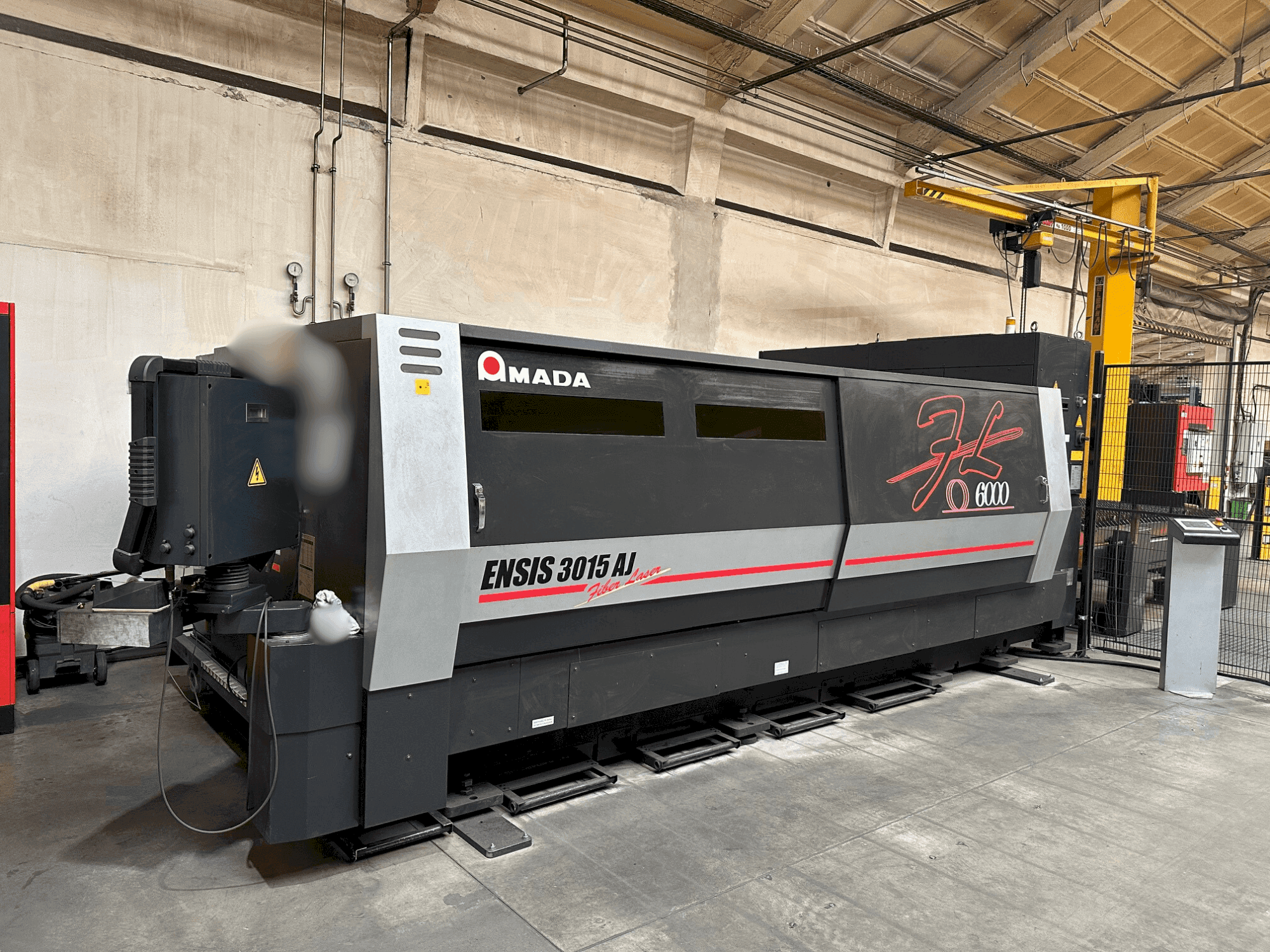 Front view of AMADA ENSIS-3015 AJ machine