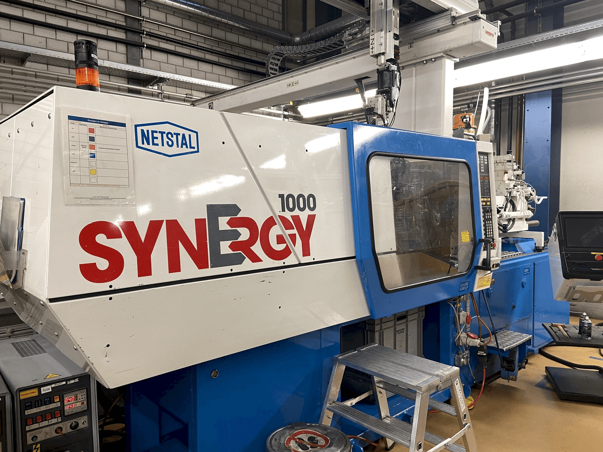 Front view of Netstal Synergy 1000-230 machine