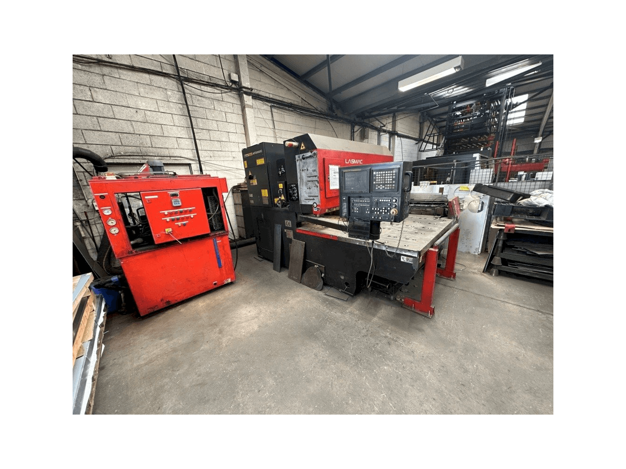 Front view of AMADA Lasmac LC1212A3 machine