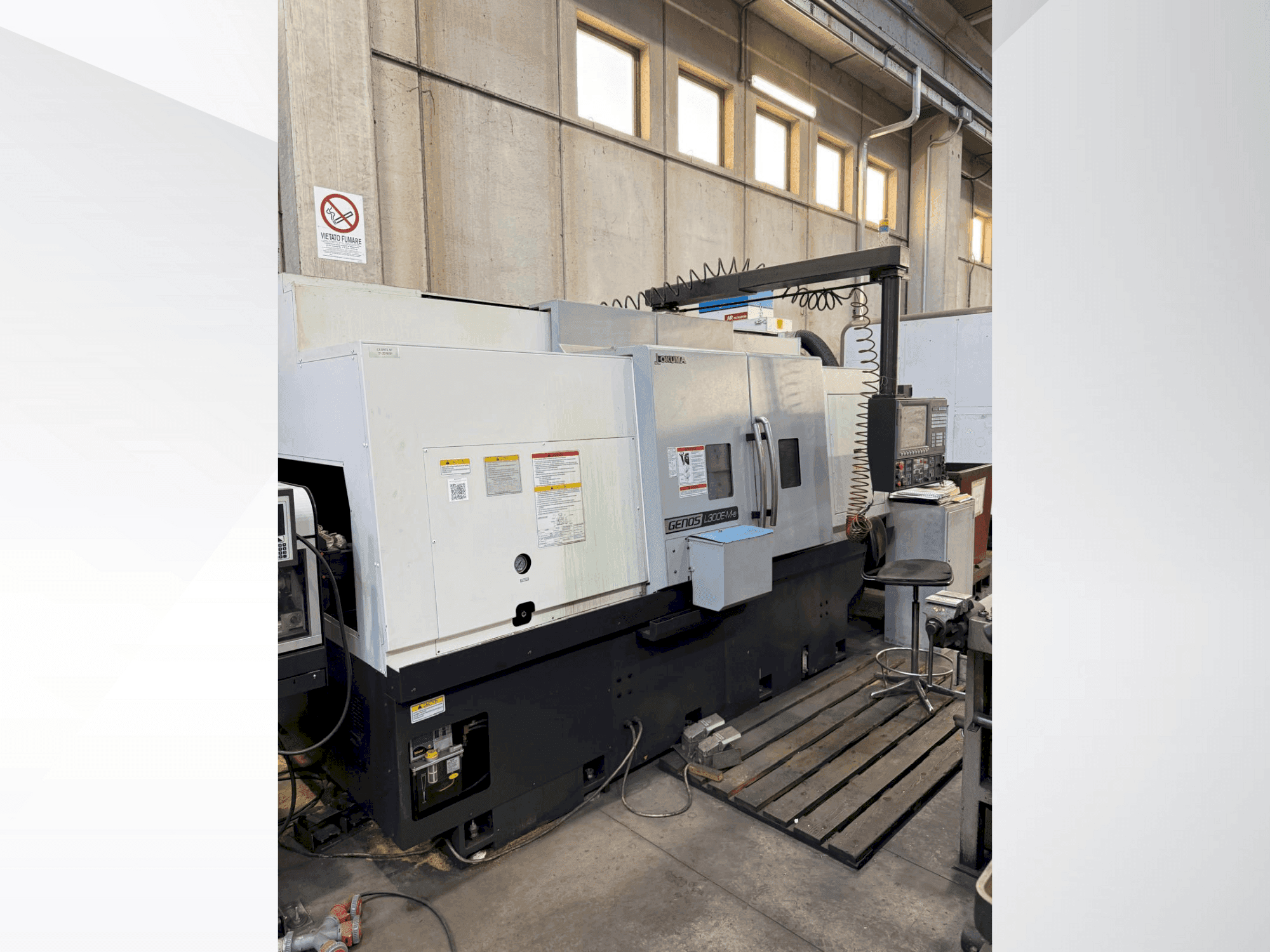 Front view of Okuma Genos L 300E-MY-e machine