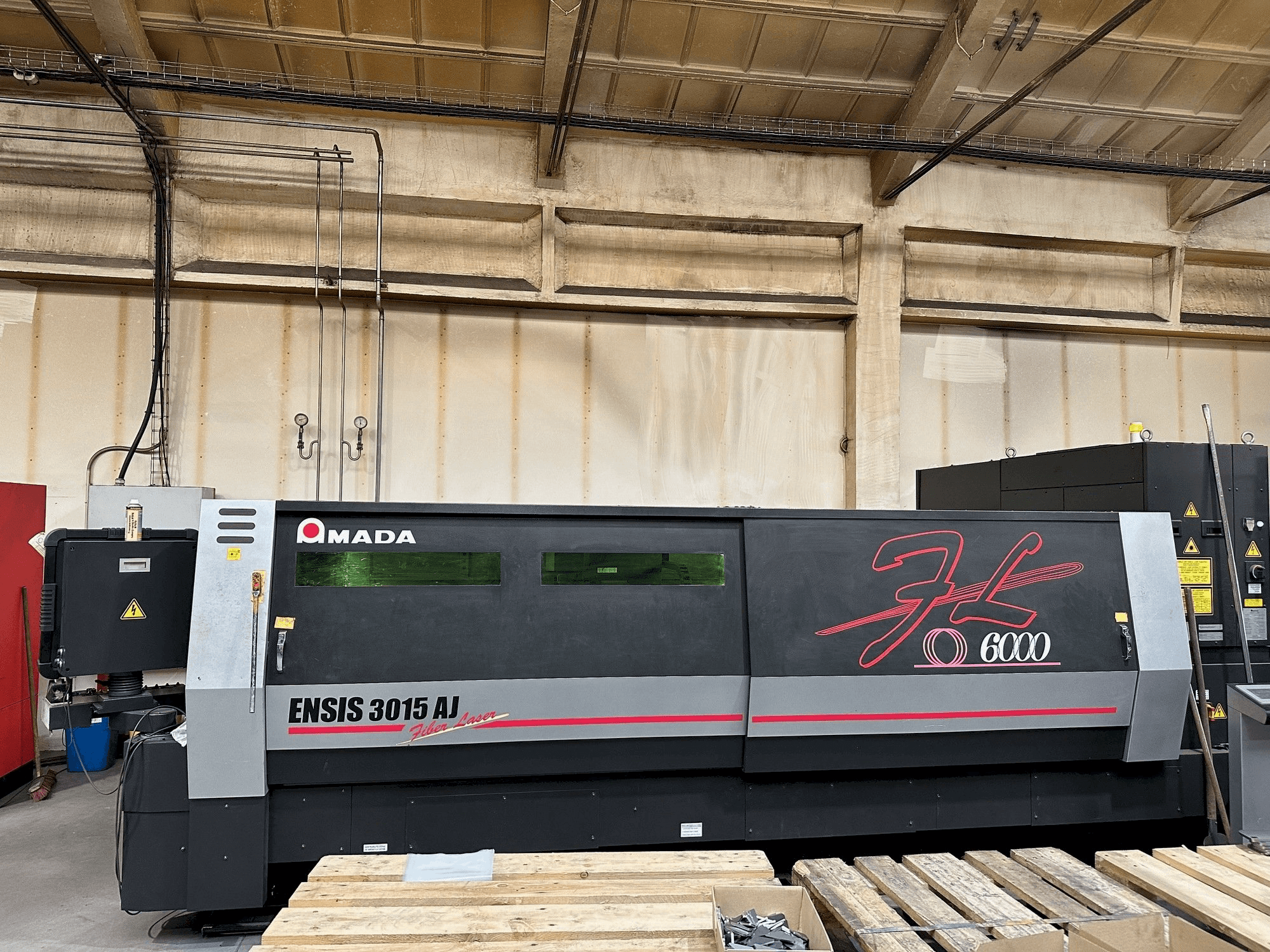 Front view of AMADA ENSIS-3015 AJ machine