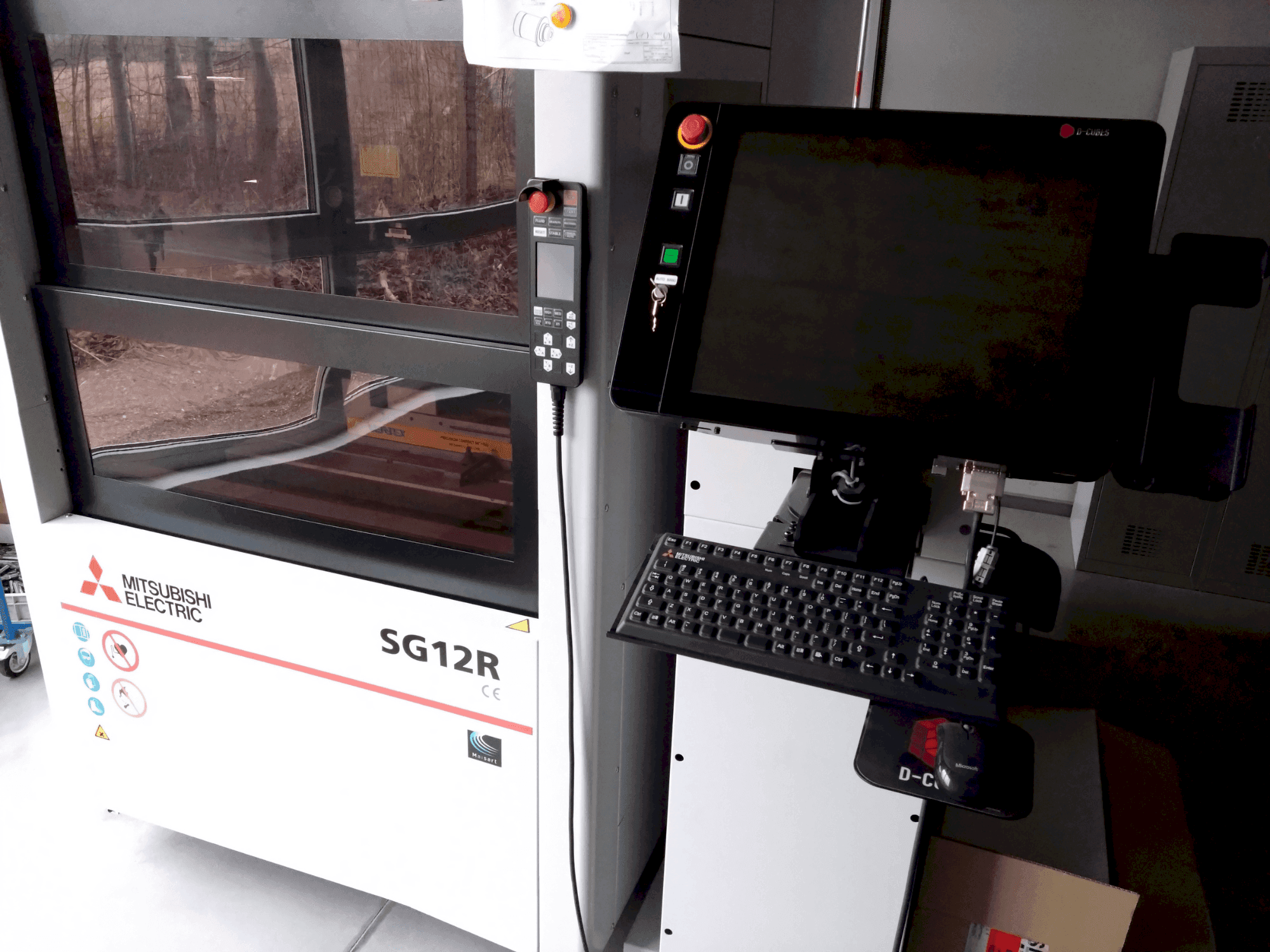 Front view of Mitsubishi Electric SG12M machine