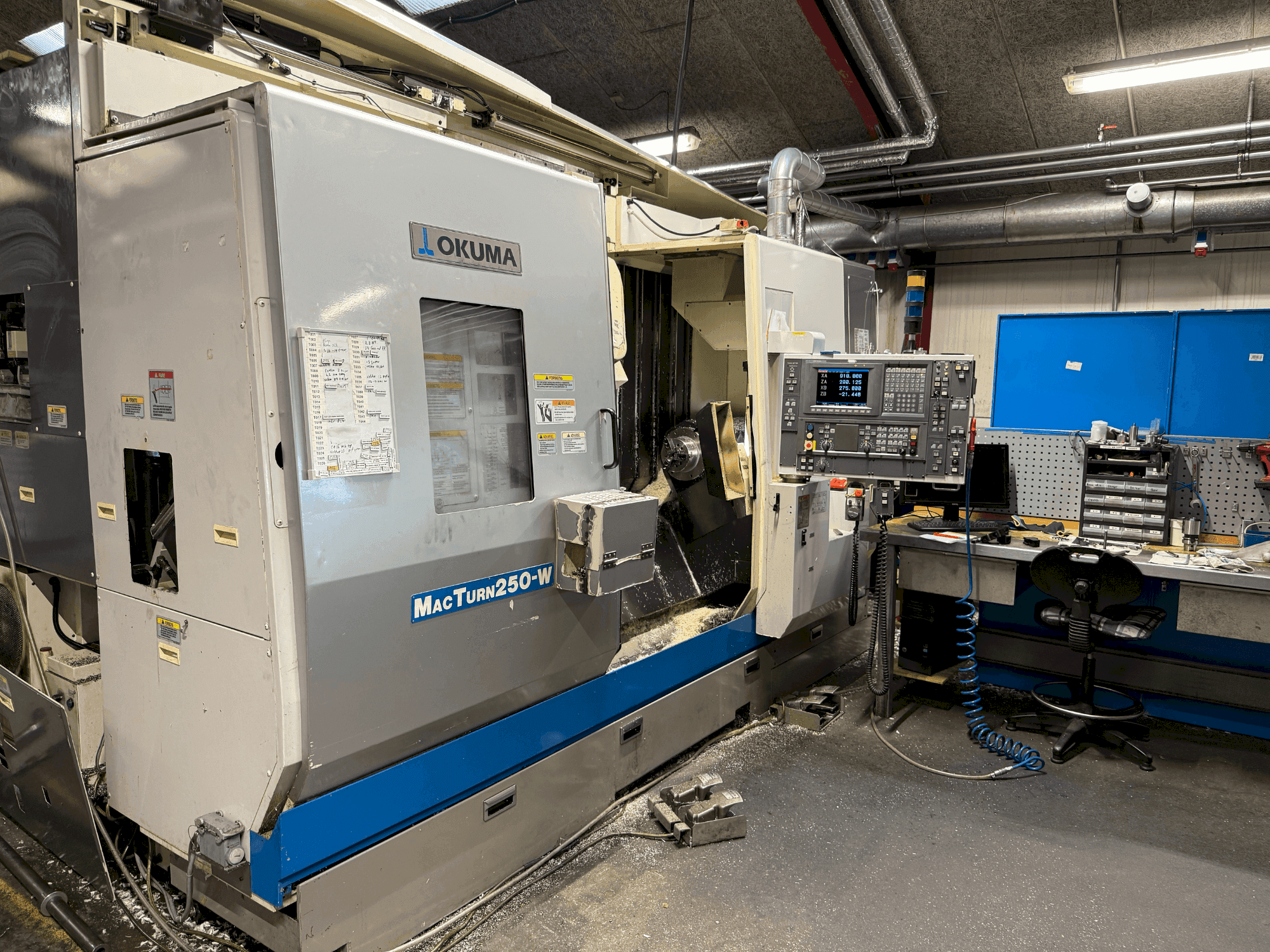 Front view of Okuma MacTurn 250-W machine