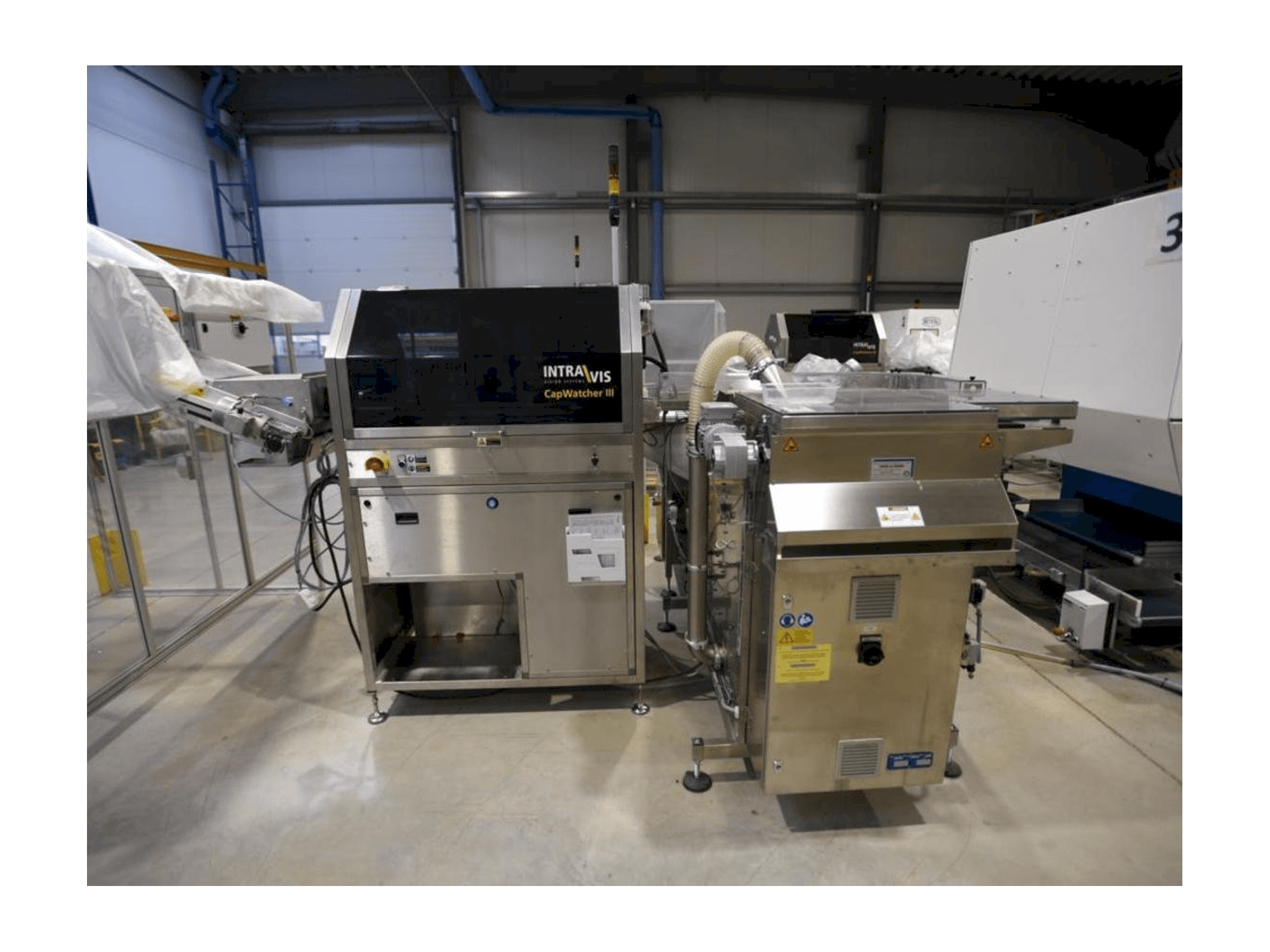 Front view of INTRAVIS Capwatcher 6431 machine